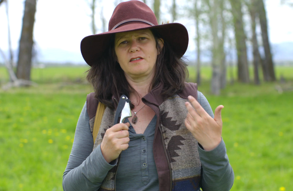 Nicole holds a garlic press for brix